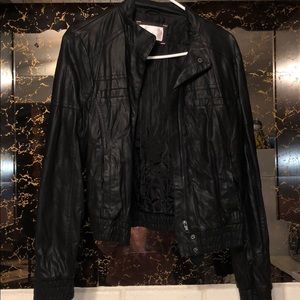 A black non-leather jacket.